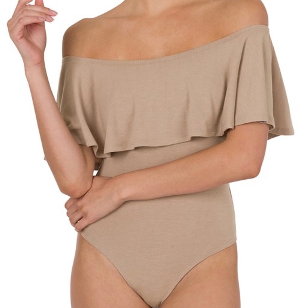 Women Off The Shoulder Top. 
RUFFLE OFF THE SHOULDER